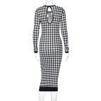 Bagfra på mannequin: dyb åben ryg-detalje på houndstooth midikjole med sort ribbekant i hem — Venzelo