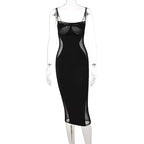 Sort tætsiddende midikjole med bustier-brystparti og mesh-paneler, frontvisning på mannequin — Venzelo