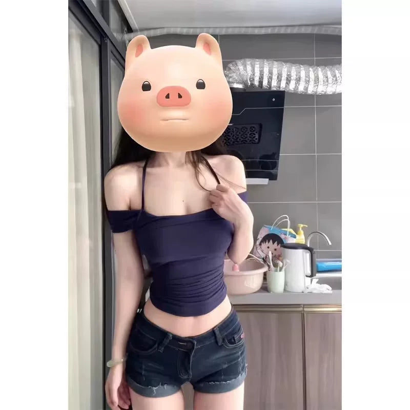Marineblå halterneck crop top med ruched midje set fra siden — Venzelo