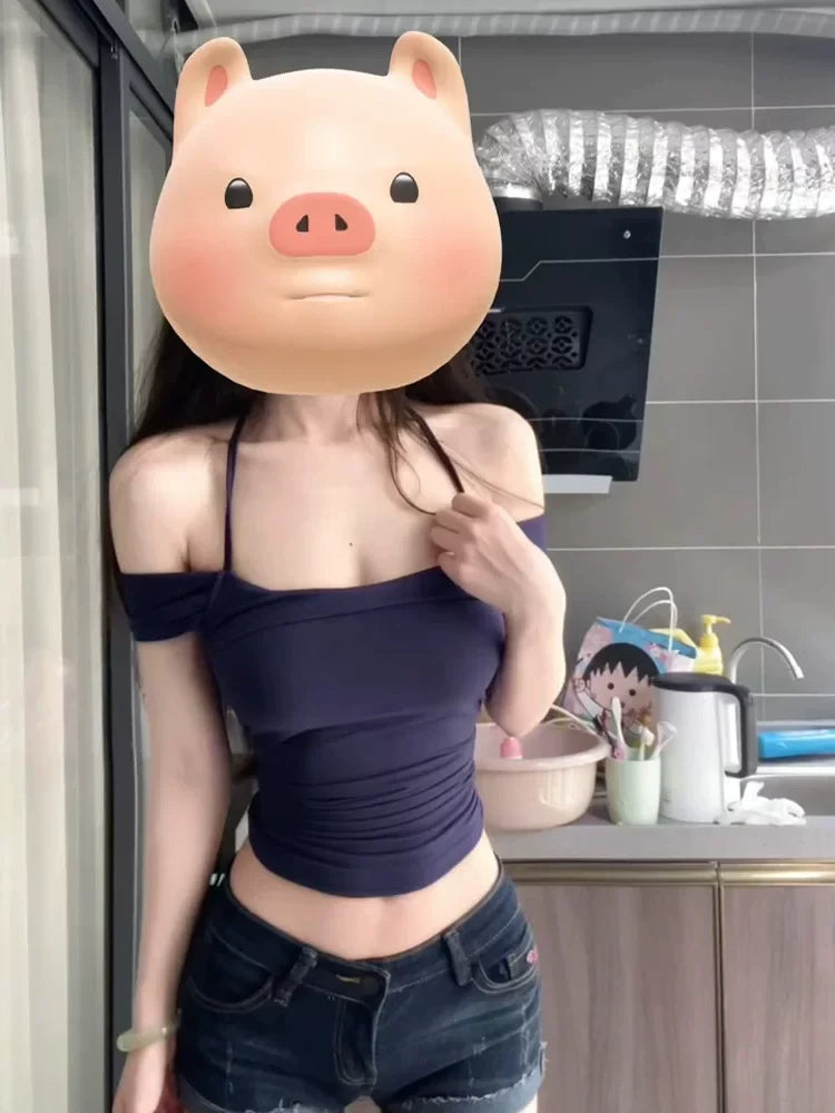 Marineblå skulderfri crop top med krydsende halterneck-strop, forfra — Venzelo